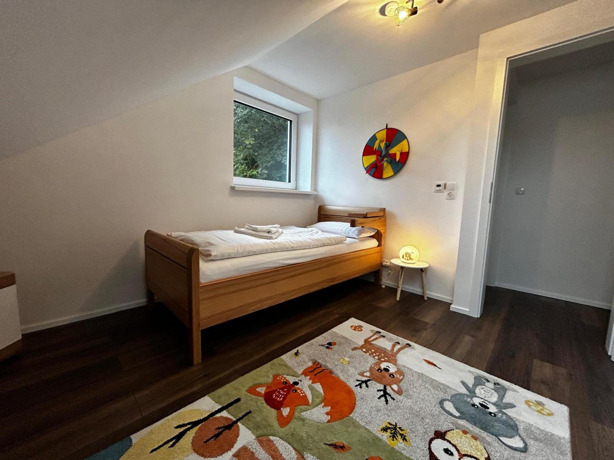 Moderne Ferienwohnung Fuer Familien Im Dachgeschoss Bosau Exterior foto
